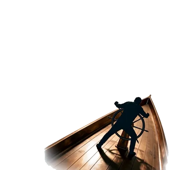 Une silhouette prend la barre d'un navire.
