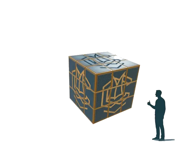 Le cube reformé, portant le symbole Commenda gravé sur ses faces.